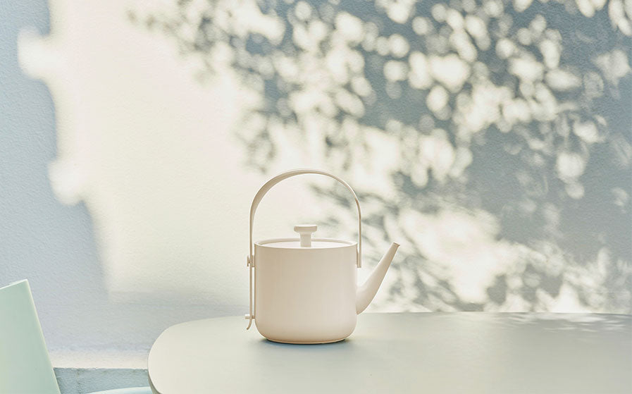 TINGHOME Teawith Cup – Rice White ceramic cup with minimalist design, perfect for tea lovers seeking simplicity and elegance.